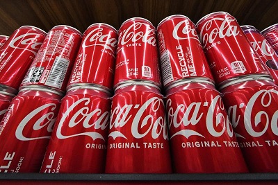 Coke revenue rises along with prices