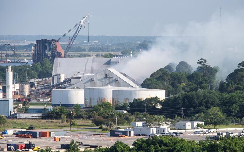 Burning warehouse staff delayed calling firefighters