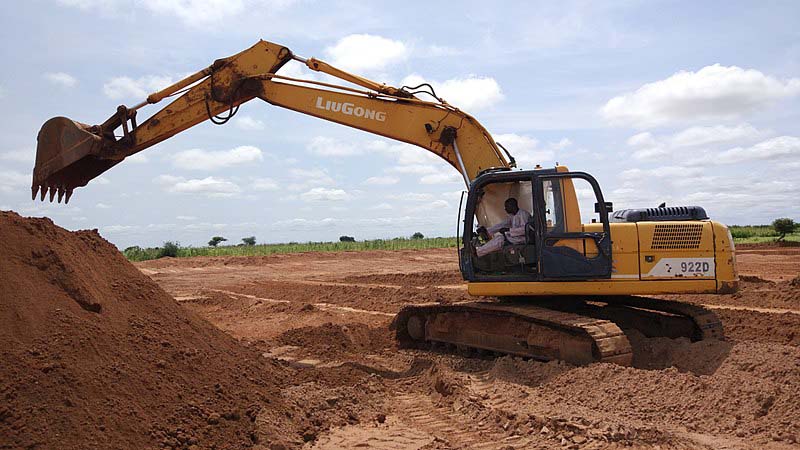 Excavator buried in landslide