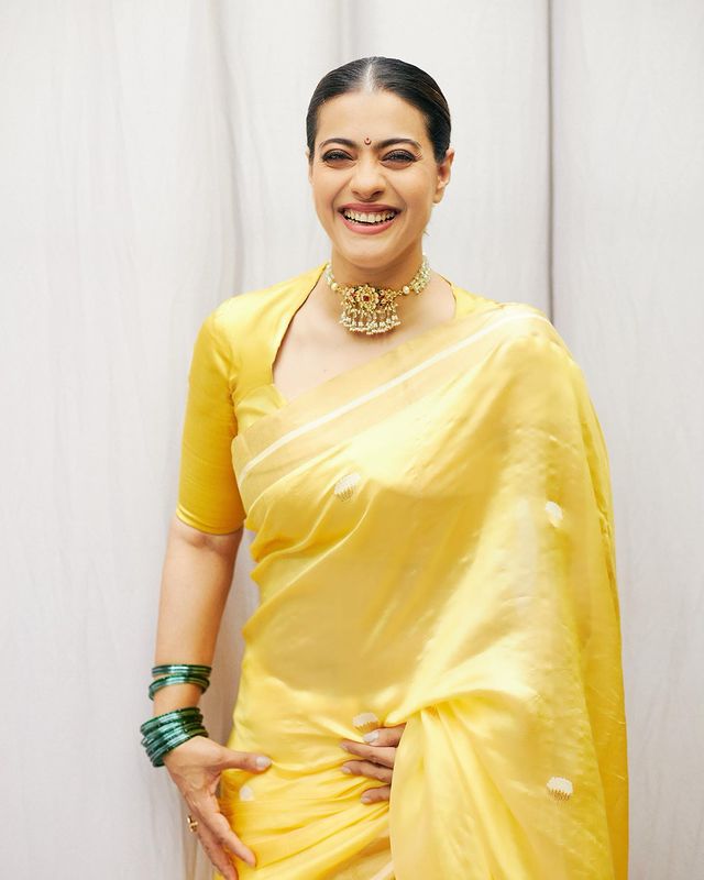 Kajol looks gorgeous in yellow saree as she drops pictures from Ganesh Chaturthi celebrations