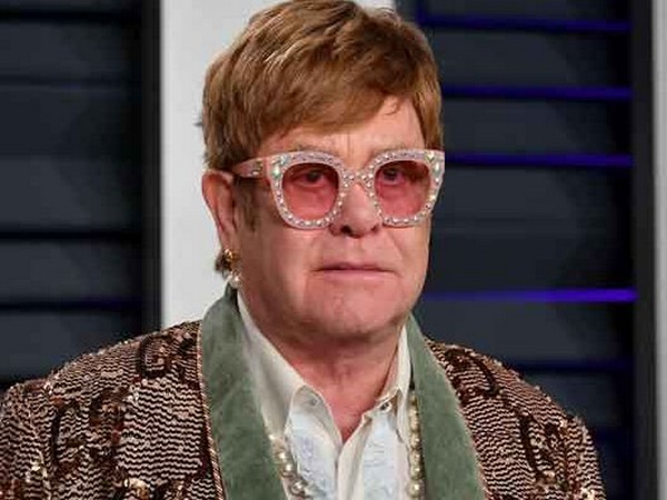 Elton John honors the Queen during Toronto concert, says she worked bloody hard