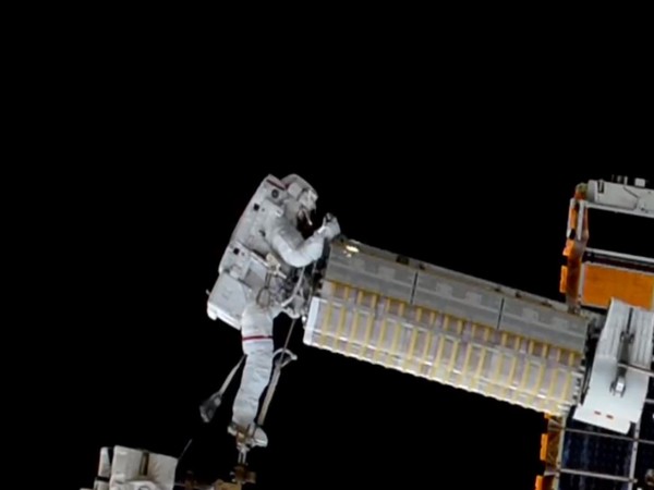 NASA astronauts install new roll-out solar array