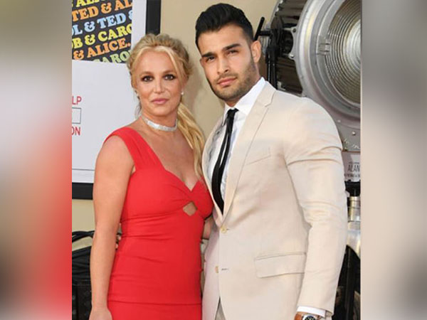 Britney Spears’ husband says not posting topless photos