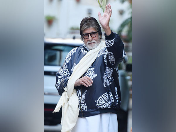 Big B in homemade sling as he meets fans