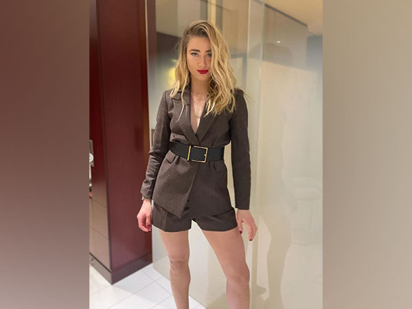 Amber Heard denies quitting, keeps moving