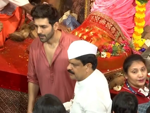 Indian Actor Kartik Aaryan Prays at Lalbaugcha Raja