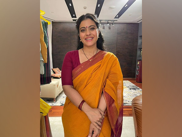 Indian actress Kajol celebrates first day of Navratri in orange saree