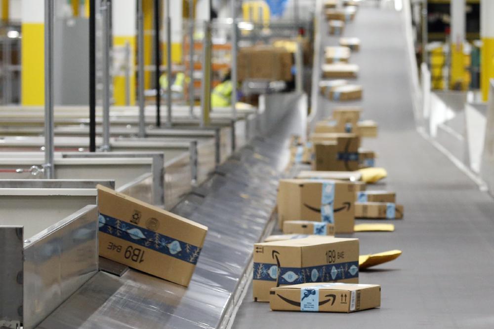 Amazon’s profit triples as pandemic boom continues