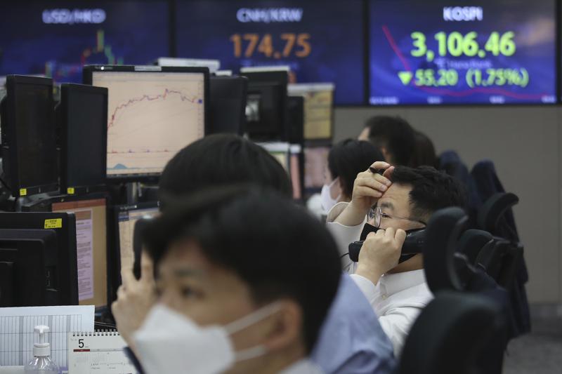 Asian stocks follow, Wall St lower