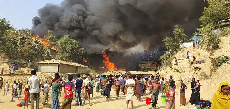 Fire guts hundreds of shelters in Rohingya refugee camp