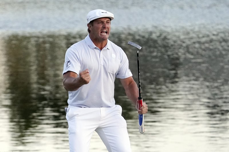 DeChambeau outlasts Westwood with big puts