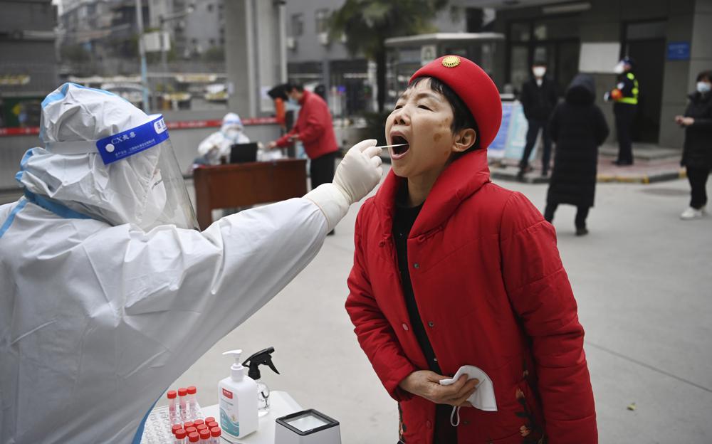 China reports major drop in virus cases