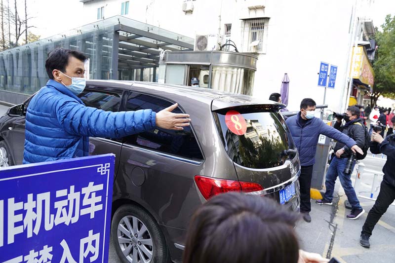 WHO team visits Wuhan hospital that had early COVID patients