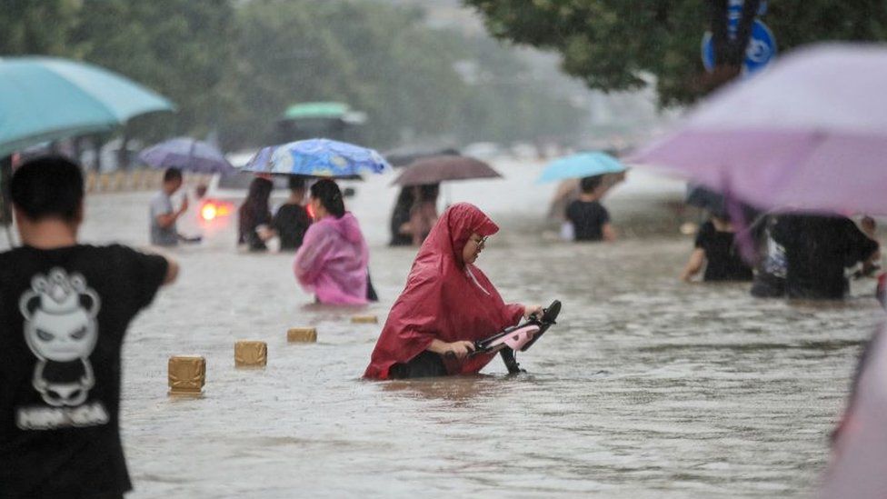 China stresses incessant flood and financial opening-up