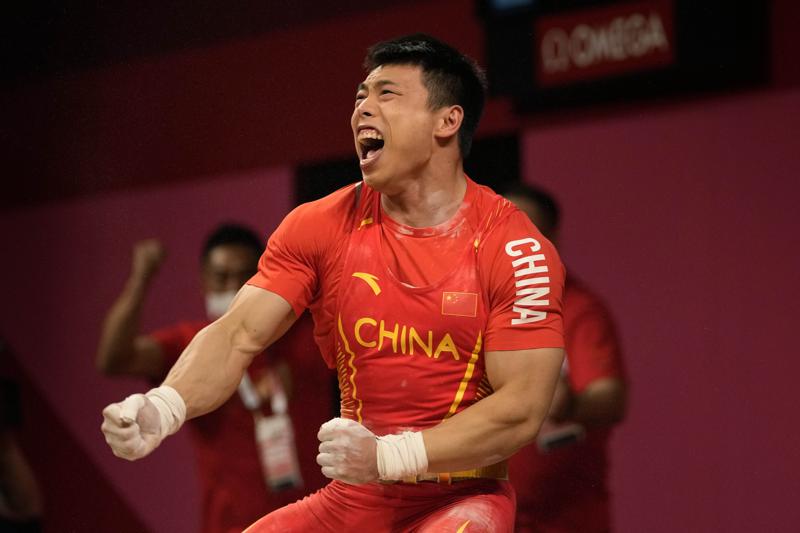 China keeps perfect record going in Olympic weightlifting