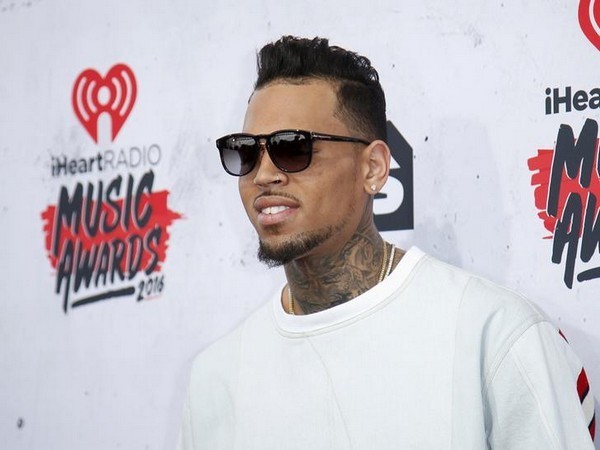 Chris Brown shows alleged texts in his defense