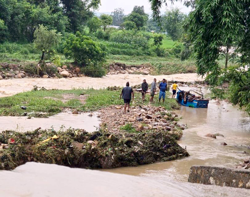 Two missing after being swept away by floods