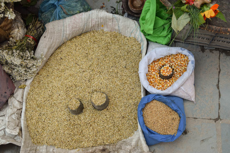 Vendors selling grains and soil for Ghatasthapana