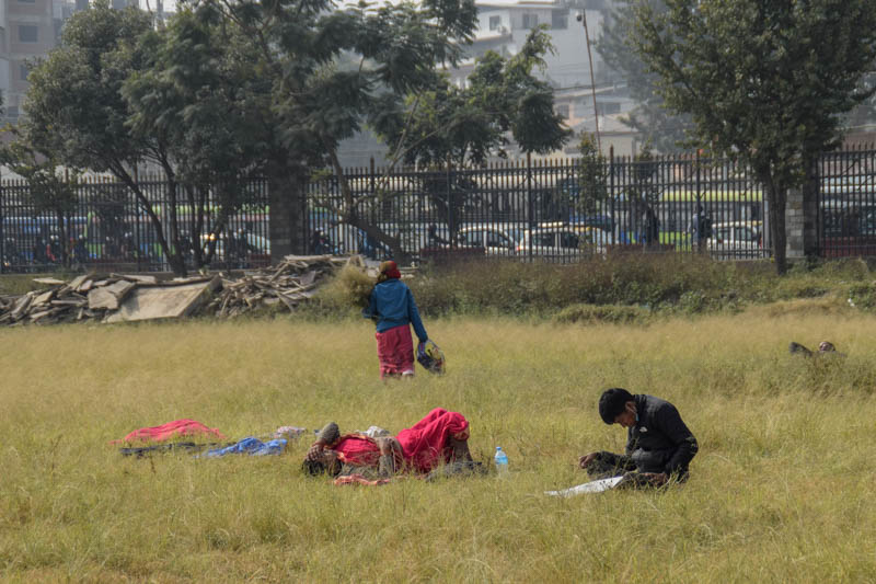 In photos: People sun basking on Tundikhel ground