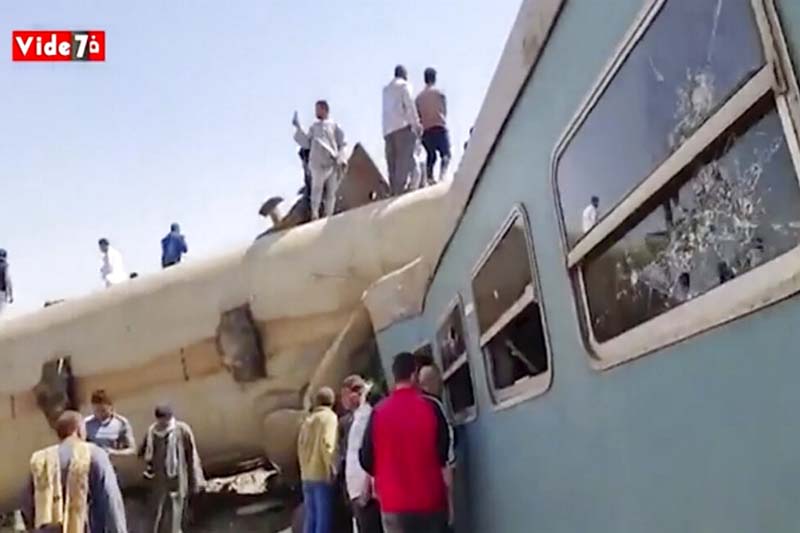 Trains collide in southern Egypt, killing at least 32