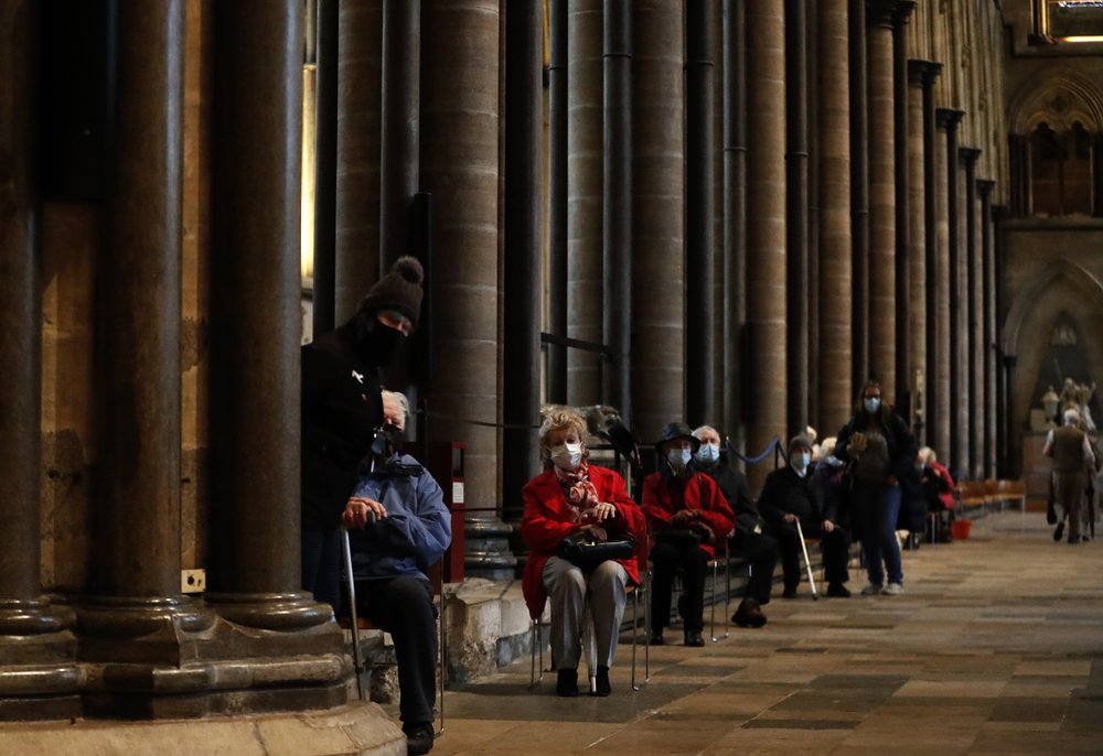 Organists offer soundtrack to jabs at medieval UK cathedral