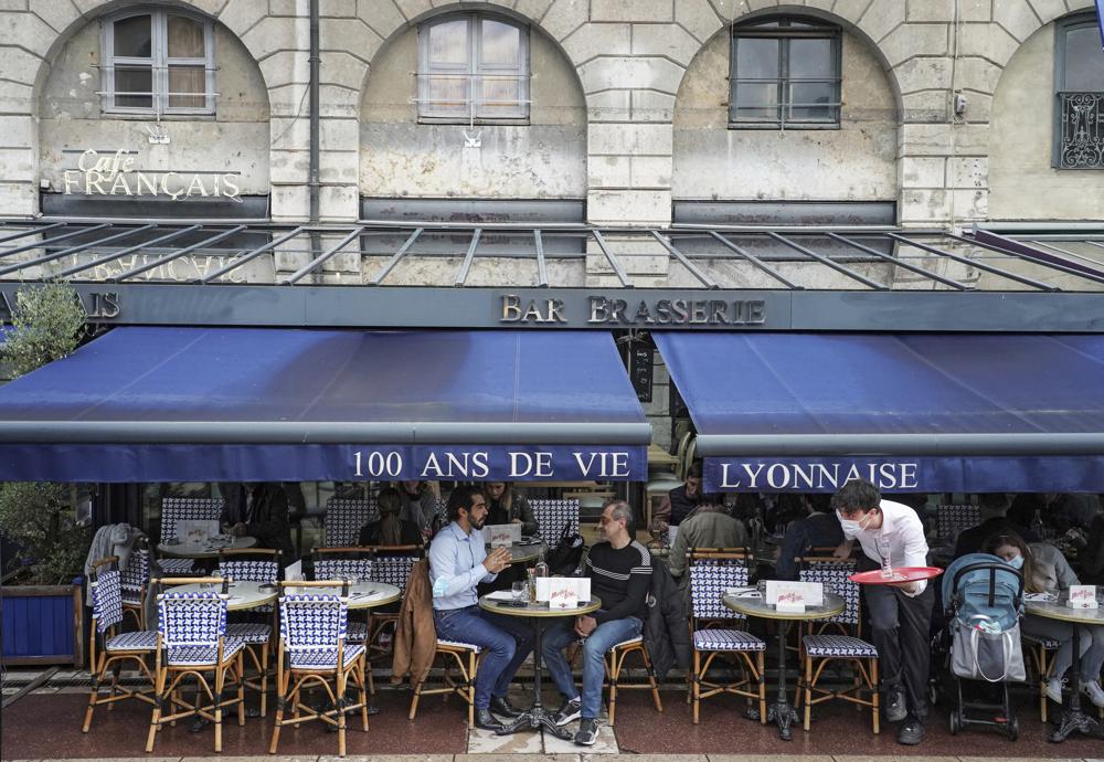 Grand day for the French: Cafe and bistro terraces reopen