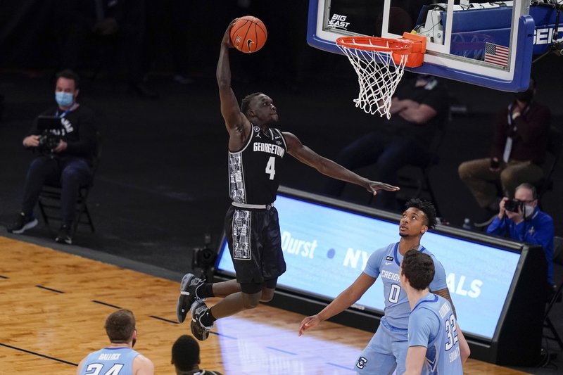 Ewing, Georgetown take Big East, NCAA bid with stunning rout