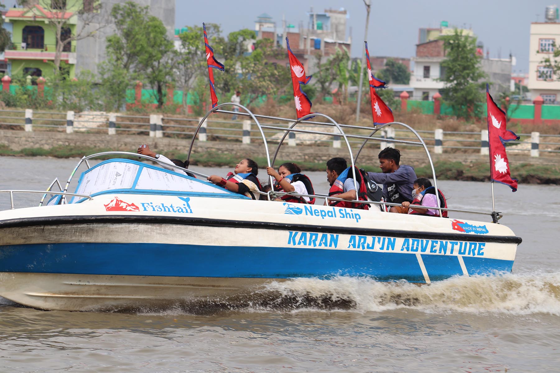 Tourists enjoying a motorboat ride