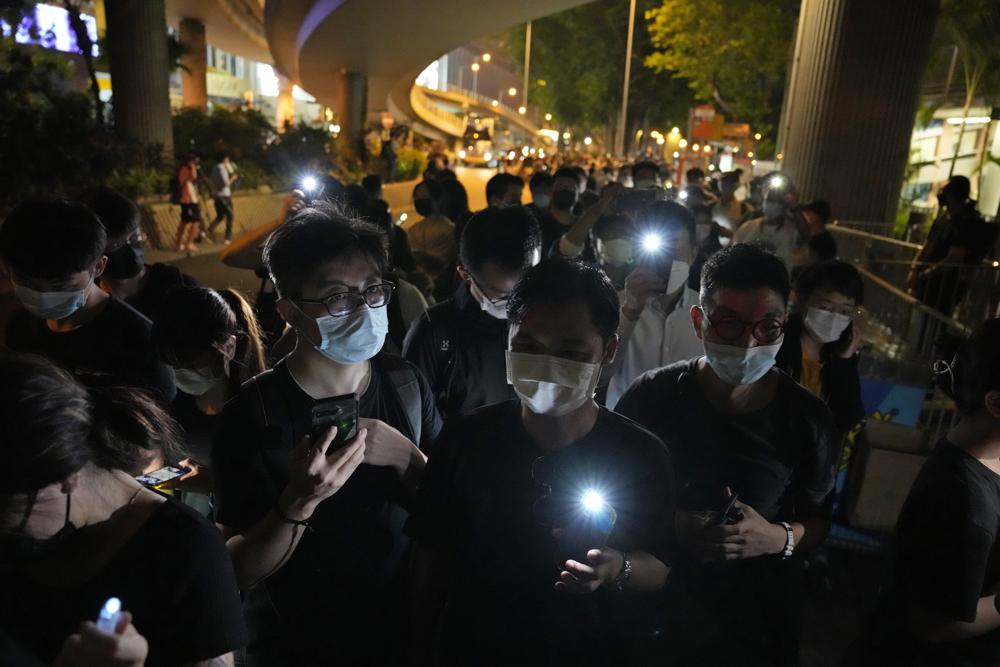 Hundreds show up around Hong Kong park despite vigil ban