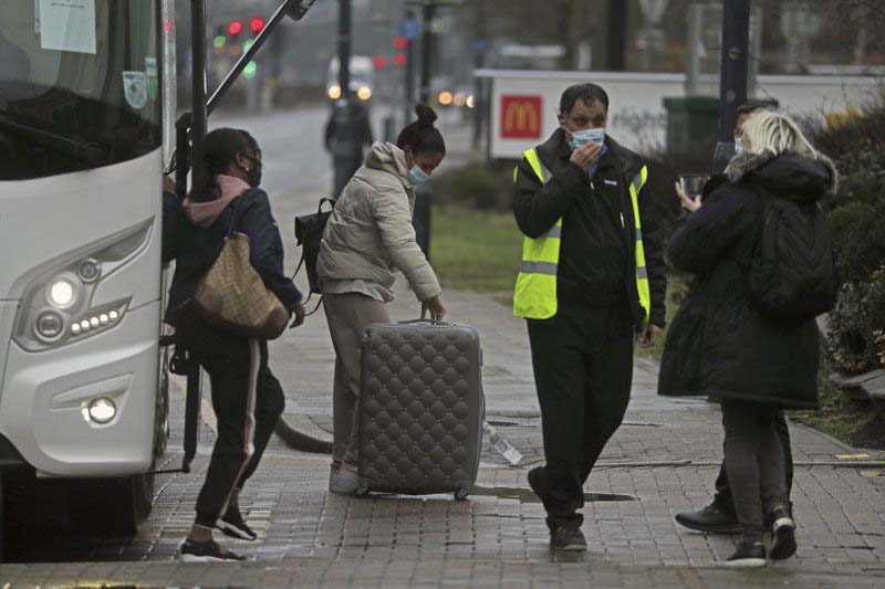 UK opens quarantine hotels, pushes on with vaccine drive