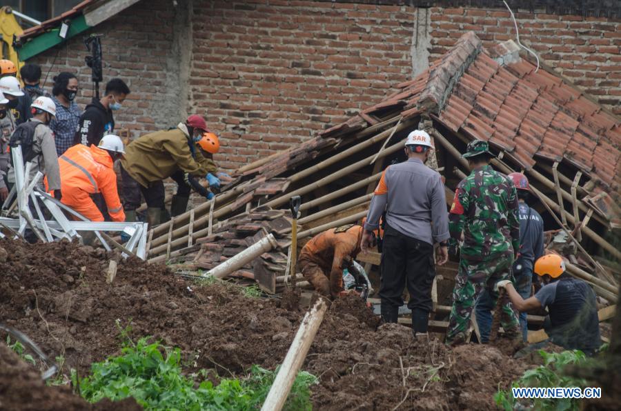 At least 13 dead in Indonesian landslide