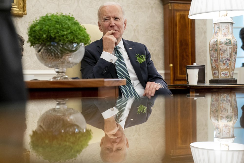 Who deserves credit? Biden leans into pandemic politics