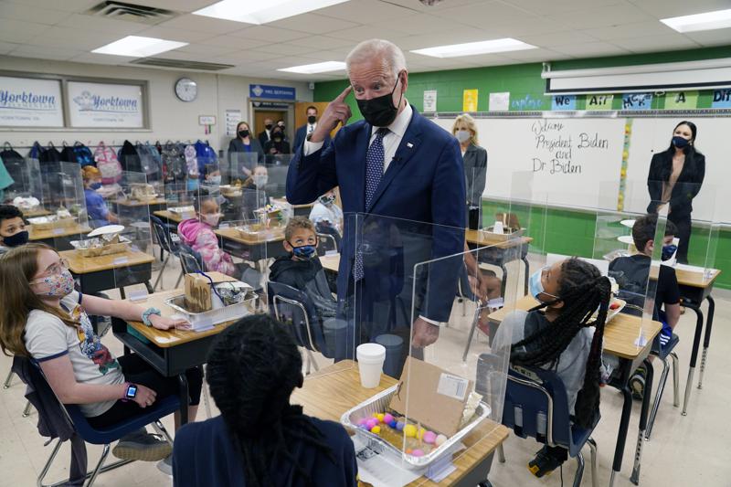 Biden hits schools goal though many learn remotely