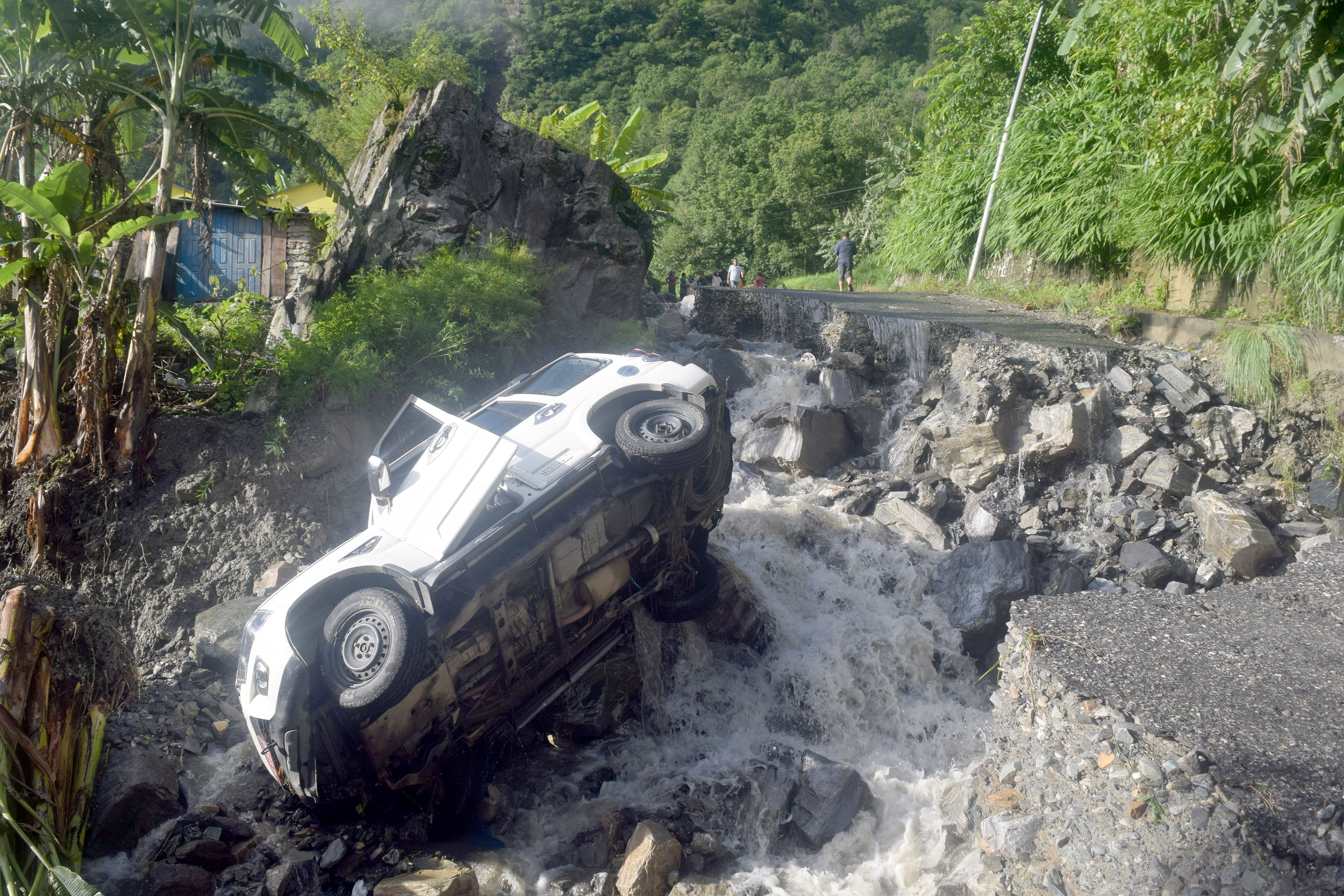 Flood sweeps away jeep, different structures damaged