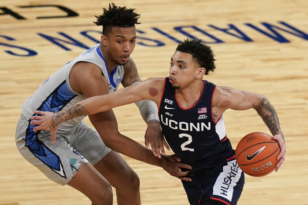 No. 17 Creighton tops UConn 59-56 to reach Big East finals