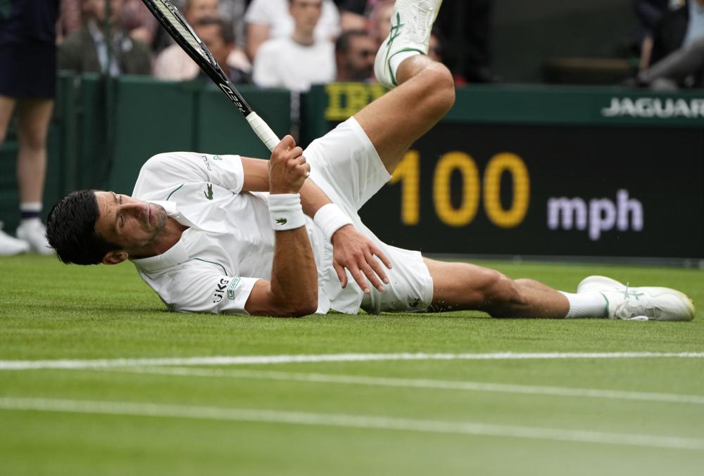 Wimbledon’s Centre Court slippery even with roof closed