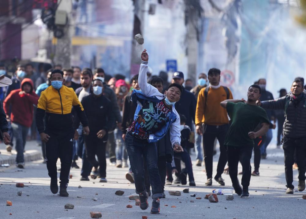 Protesters against US grant clash with riot police in Nepal