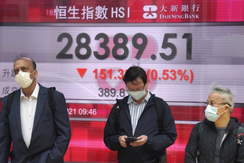 Asian shares trade mixed on recovery hopes, yield worries