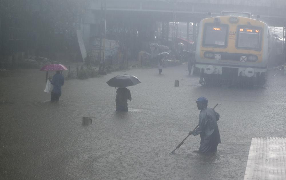 3-story building collapses in India in heavy rain, kills 11