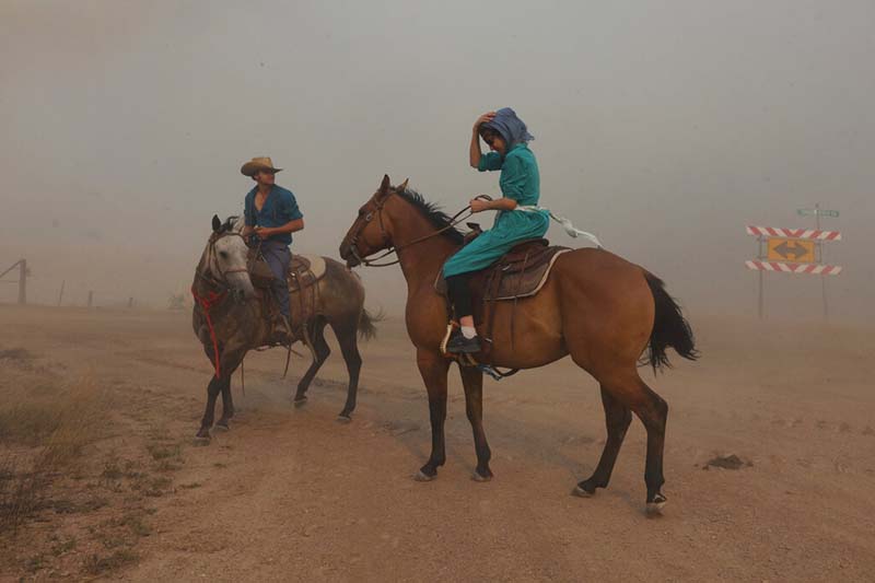 California fire grows as Montana blaze threatens towns