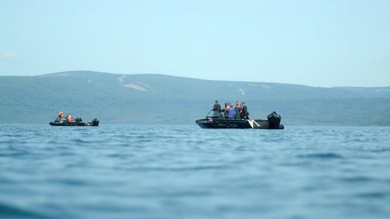 Tourist helicopter crashes in Russian crater lake; eight missing