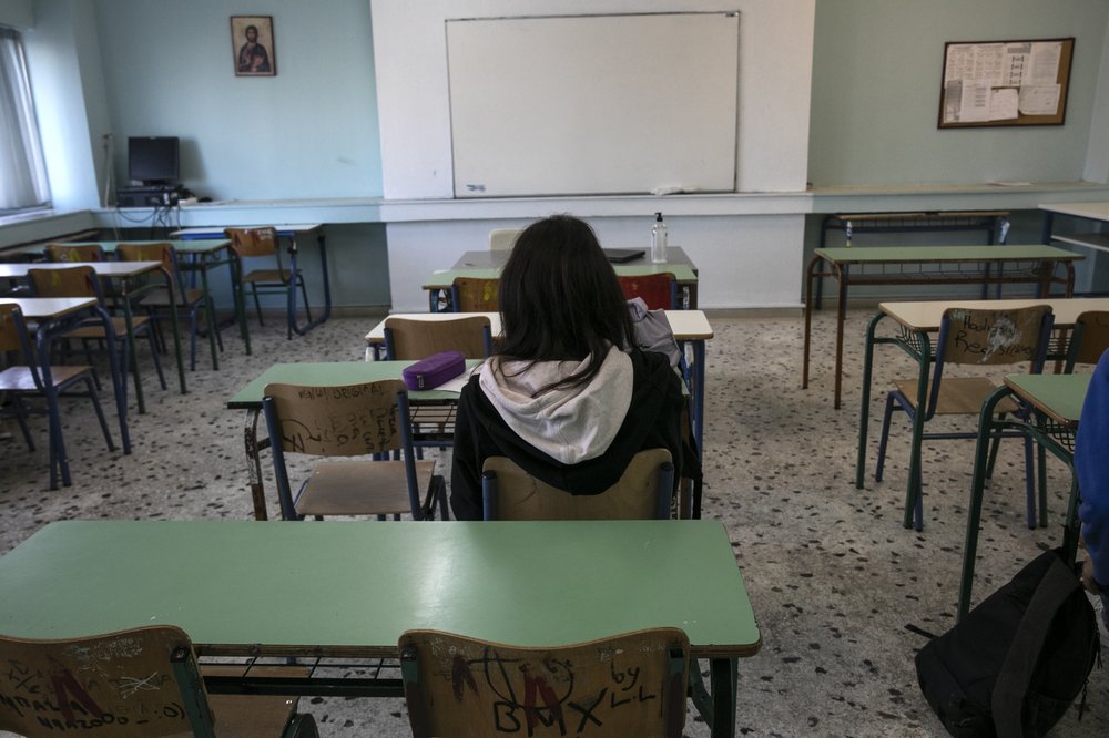 Greece pins hopes on mandatory home testing, opens schools