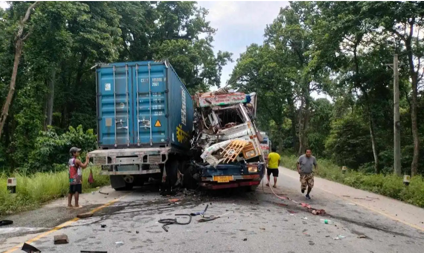 Drivers dead as two trucks collide head on