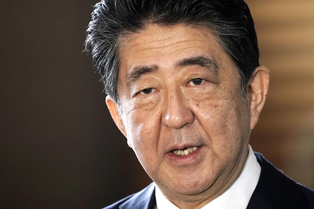 Abe’s complicated legacy looms large for current Japan PM