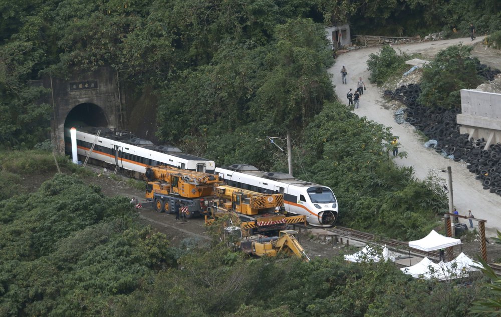 Taiwan prosecutors probe train crash that killed 51