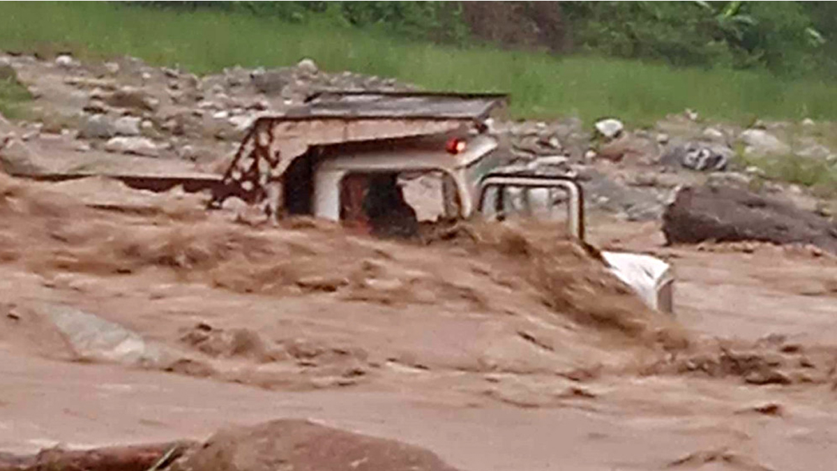 Tipper driver swept away by river