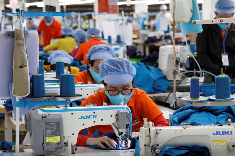 Vietnam revs up economy to race ahead of rivals, Keeping coronavirus at bay