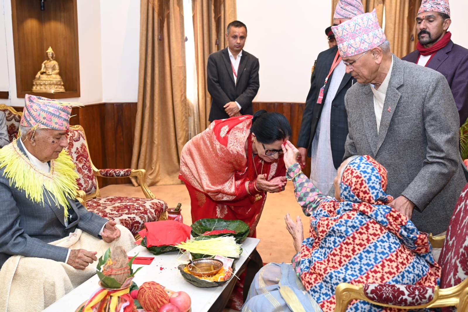 President Paudel receives tika from his elder sister-in-law