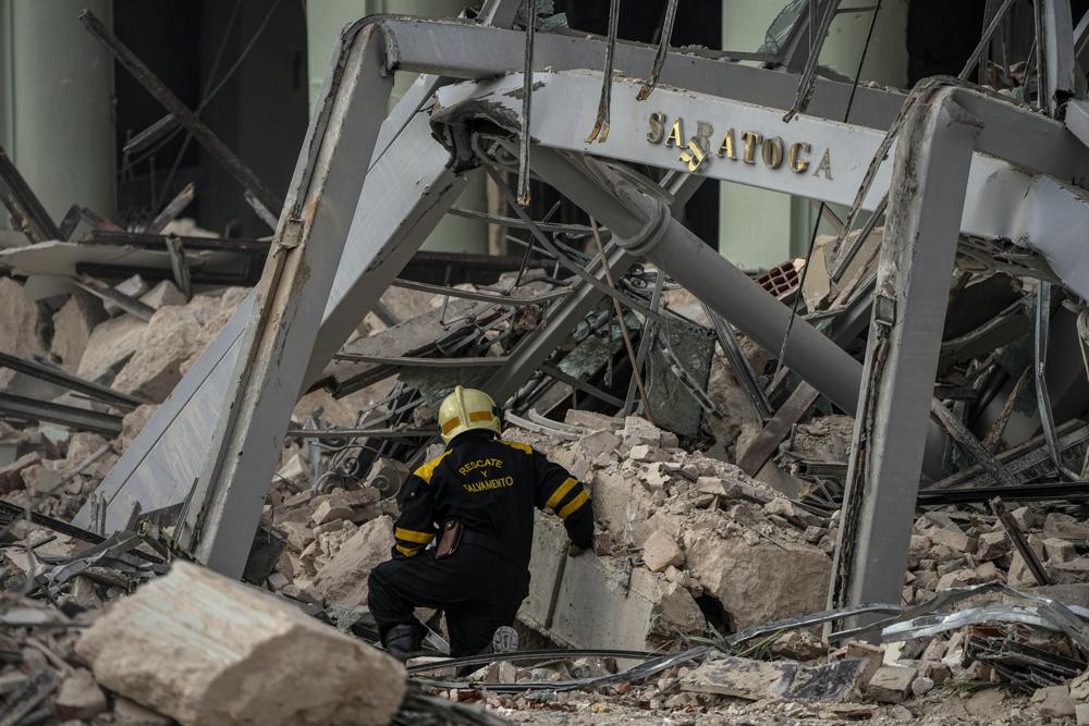 Rescuers look for victims at Cuba hotel after blast kills 22