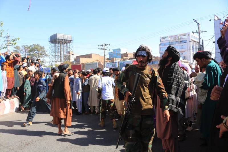 Taliban hang body in public; signal return to past tactics